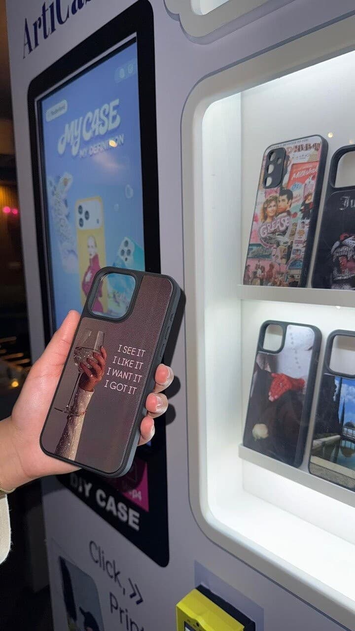 Customer holding a personalised phone case